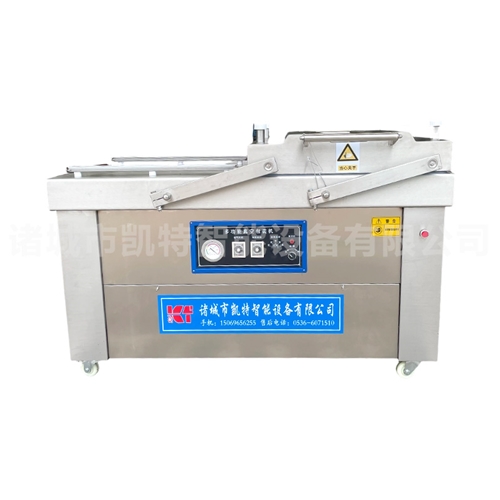 Double chamber vacuum packaging machine